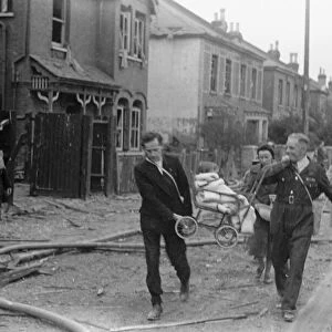 Alfieri. Air Raid damage at Malden, London. August 16th 1940