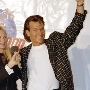 American actor Patrick Swayze arrives for the grand opening of the Planet Hollywood