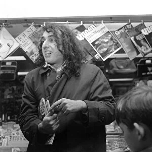 The American falsetto singer Tiny Tim was besieged by autograph hunters when fans