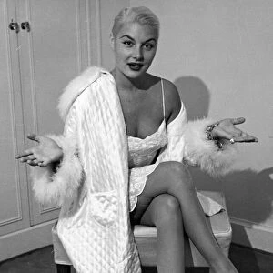 American film actress Barbara Payton in her hotel room in London