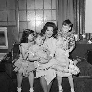 American singer Connie Francis pictured with her adopted children