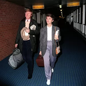 Anne Diamond TV Presenter at London Airport December 1986 with har husband Mike