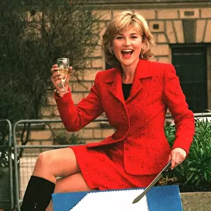 Anthea Turner TV Presenter celebrates 1 year of the National Lottery with a cake