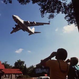 Antonov 124 Cargo aircraft comes in to land at Farnborough Aug 90 past two aircraft