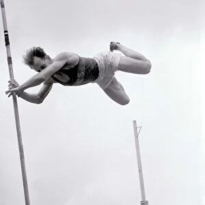 Athletics Field Events Pole Vault Man knocks off the bar during an attempt at