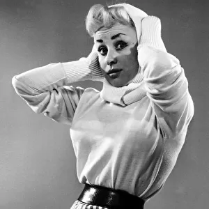 Barbara Windsor Actress 20 years old wearing a tight jumper head scarf