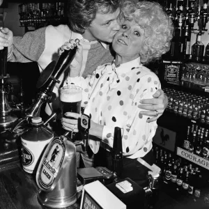 Barbara Windsor and her boyfriend Steve Hollings celebrate in their new pub