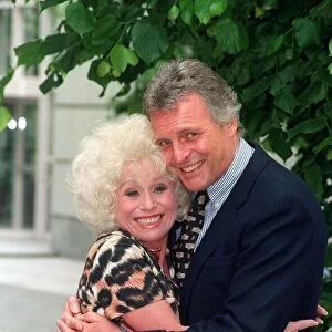 BARBARA WINDSOR AND PETER DEAN - ACTORS CUDDLE EACH OTHER AT THE LAUNCH OF THE PLAY