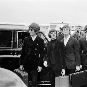 Beatles 1966 The Beatles greet their fans as they arrive at London Airport before