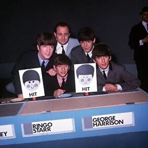 The Beatles appear on Juke Box Jury with David Jacobs. Left to right: John Lennon
