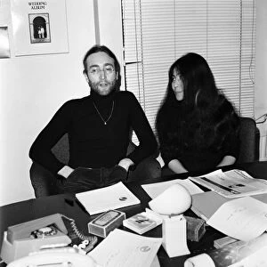 Beatles singer John Lennon with wife Yoko Ono at Apple headquarters as he sends his MBE
