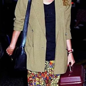 Beverley Callard actress arrives back in Manchester suntanned after Carribean cruise