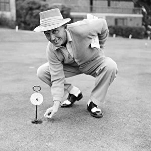 Bing Crosby on the golf course playing for charity, September 1952 A©Mirrorpix
