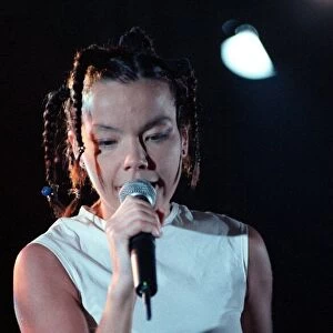 Bjork singer from Iceland on stage at the Irvine Festival with microphone in hand