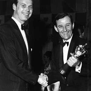 Bobby Butlin presents Reg Smythe with jester award 1963 during ceremony in London