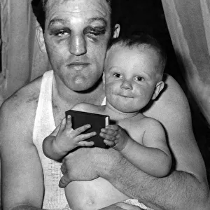 Boxer Brian London seen here with his son following his fight with Billy Hunter