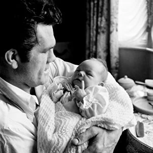 Boxer Freddie Mills and daughter Susan. July 1952 C3422-001