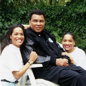 Boxer Muhammad Ali (Cassius Clay) with daughters. August 1992