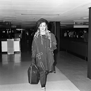 Boy George of the pop group Culture Club arriving at Heathrow from Paris