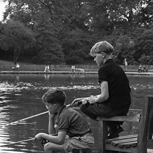 Boys fishing in Battersea Park 7th August 1963