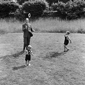 Brigadier Fitzroy Maclean playing with his sons Charles