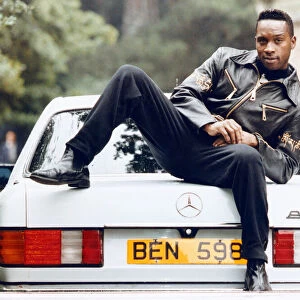 British boxer Nigel Benn with his new custom made Mercedes-Benz. 3rd July 1992