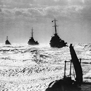 British destroyers at sea. Destroyers silhouetted against the skyline