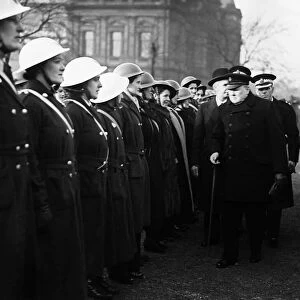 British Prime Minister Winston Churchill inspects female ARP wardens in Glasgow during