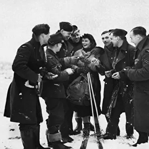 British troops in Manchester enjoying fun in the snow during the Second World War