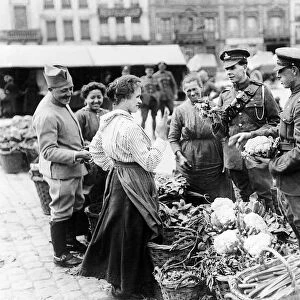 British troops shopping in a French vegetable market during the final year of World War
