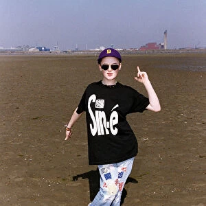 Bronagh Gallagher Actress in the film The Commitments standing on beach in black t shirt
