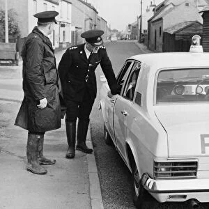 Cambridgeshire police officers beside a Ford Zephyr Police car, October 1968