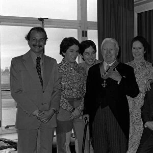 Charlie Chaplin with family receiving Knighthood 1975 with wife Una