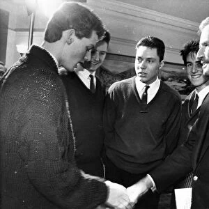 Charlton Heston meets pupils during a visit to St Thomas More School in Blaydon