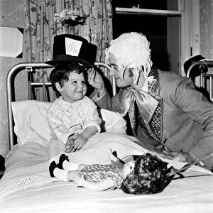 Children of Booth Hall Hospital meet character from Alice in Wonderland