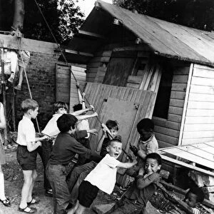 Children playing at an adventure playground in Peckham Road, Southwark