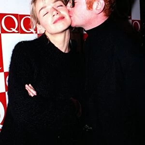 Chris Evans kisses Zoe Ball November 1997 arms folded wearing black