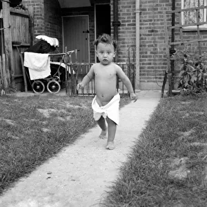 Christopher Wain adopted child seen here in the garden wearing a nappy