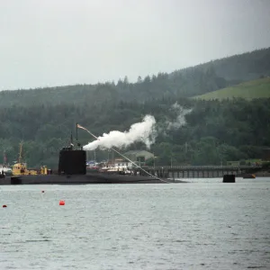 The Churchill class nuclear submarine HMS Conqueror leaves Her Majestys Naval Base