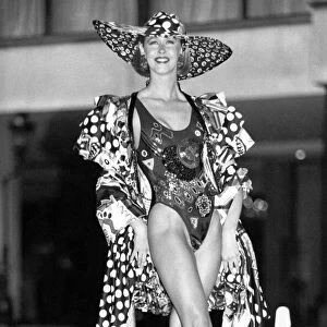 Clothing Beach: Model Juliet Seatree wears exotic dress and swimwear. April 1992 P017968
