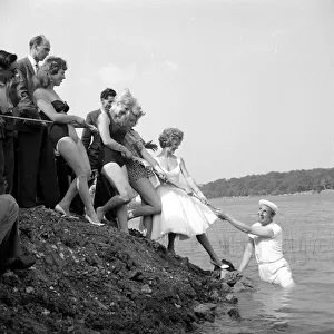 Contestants in the Maralyn Monroe competition at Ruislip Lido seen here having a tug a