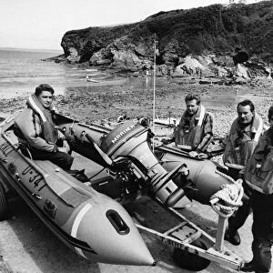 Crew of the 16 foot inflatable Little and Broad Haven lifeboat at Little Haven