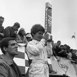 DAMON HILL, AGED SIX WATCHES HIS FATHER GRAHAM HILL RACE AT SILVERSTONE - 01 / 07 / 1967