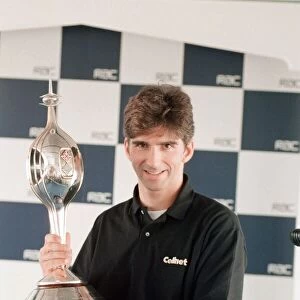 Damon Hill of Arrows-Yamaha, is presented with the Hawthorn Memorial Trophy
