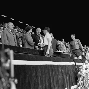 Danny Blanchflower receives the FA Cup May 1962 from Queen Elizabeth watched by