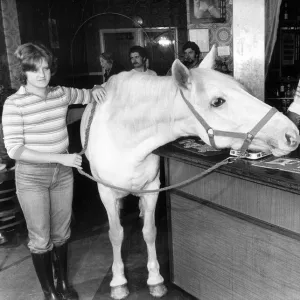 Deborah Carter, 17 can take her white horse anywhere. She takes Kelly into the bar of