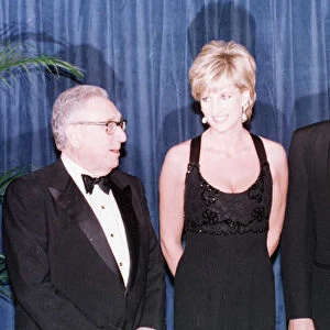 Diana, Princess of Wales accompanied by former US Secretary of State Henry Kissinger