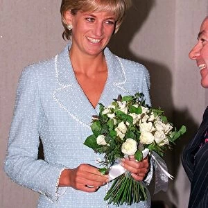 Diana, Princess of Wales is presented with the first rose to be named after her at