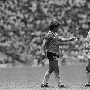 Diego Maradona (left) seen with Steve Hodge during the England v Argentina Hand of God