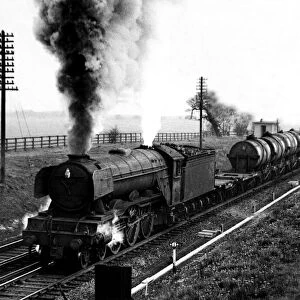 One of the diminishing number of steam engines still operating is seen hauling a freight